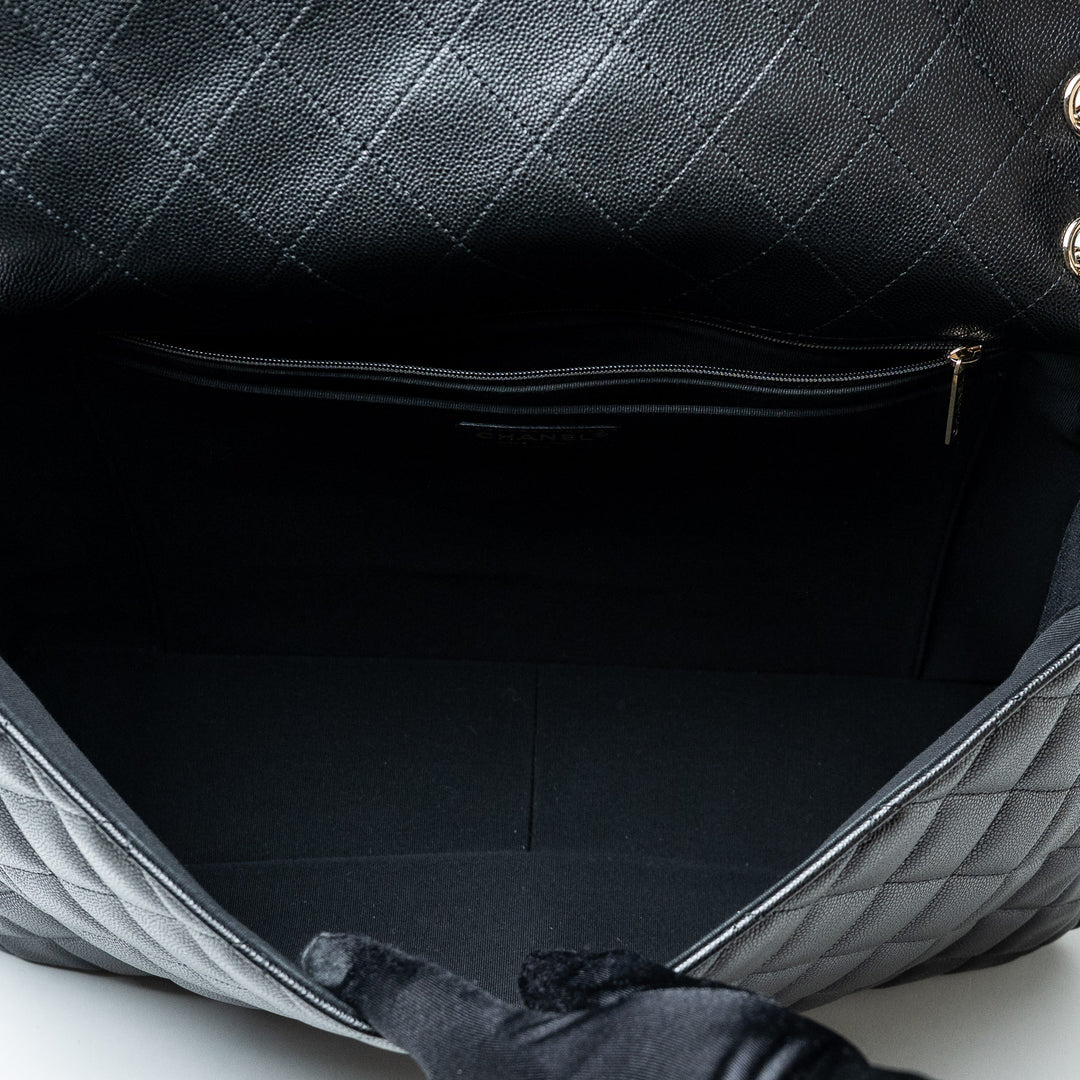 Black Caviar Leather XL Single Flap Bag. (view 8)