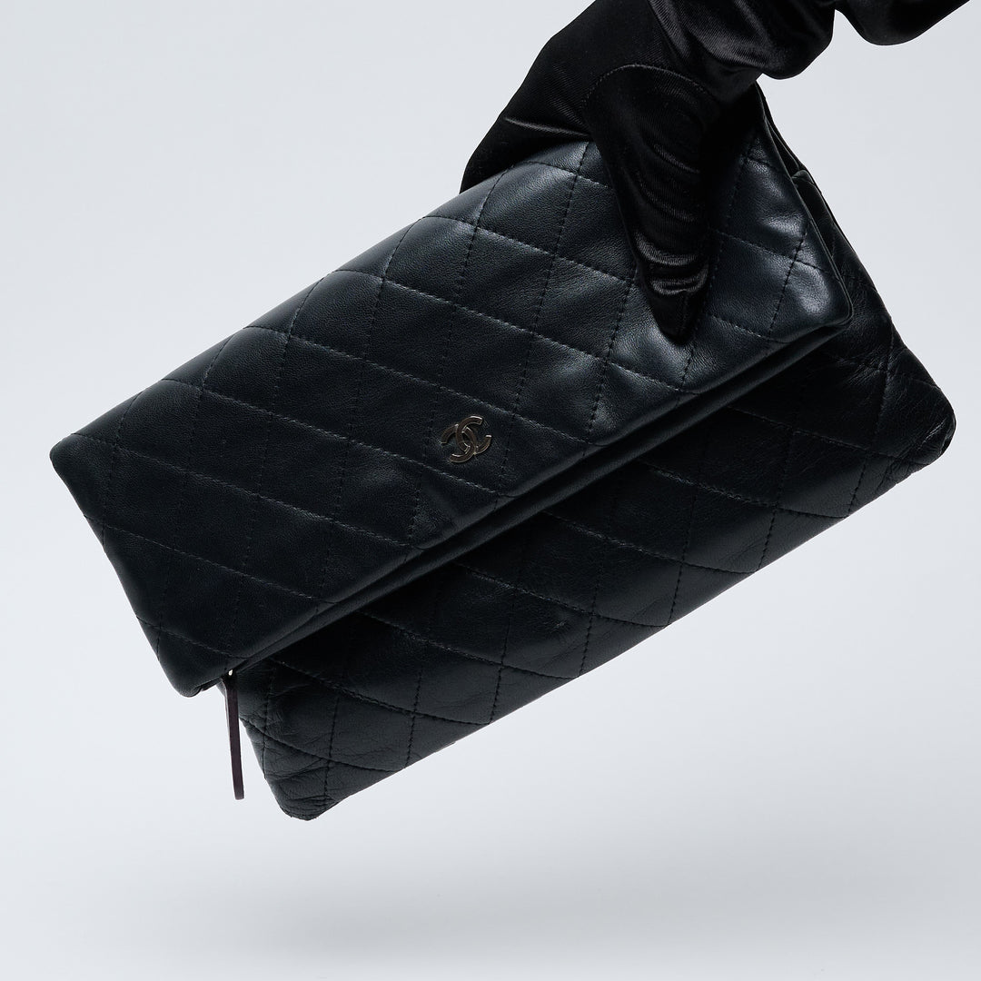 Black Lambskin Leather Quilted Fold-Over Clutch. (view 7)