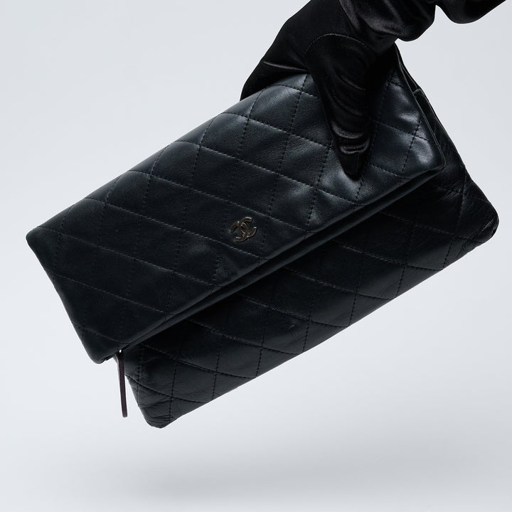 Black Lambskin Leather Quilted Fold-Over Clutch. (view 7)
