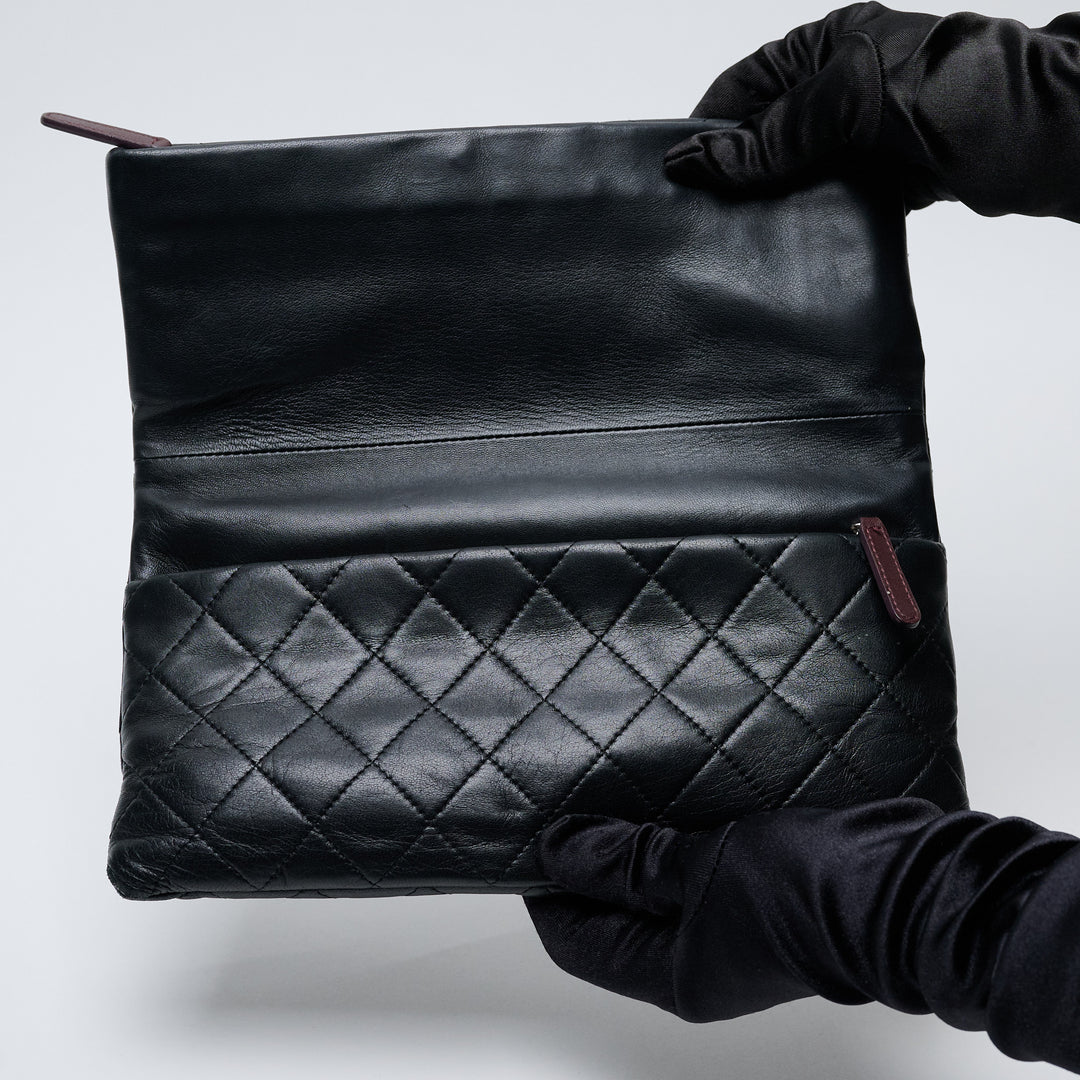 Black Lambskin Leather Quilted Fold-Over Clutch. (view 8)