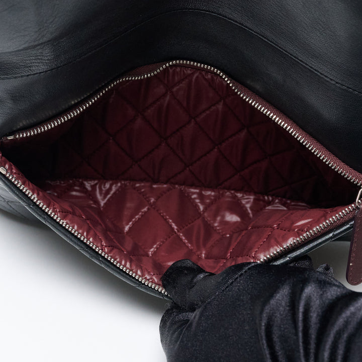 Black Lambskin Leather Quilted Fold-Over Clutch. (view 9)