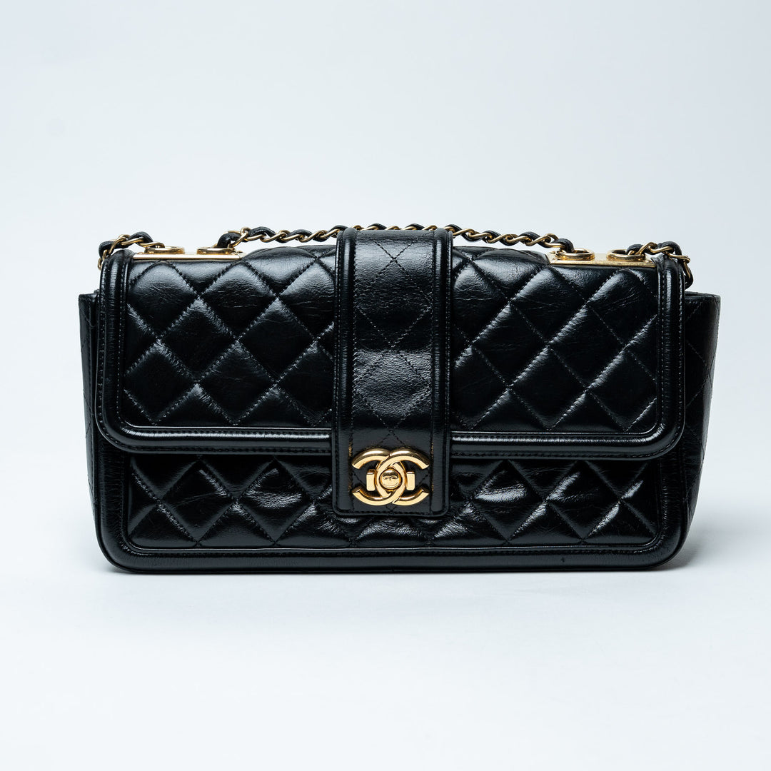 Black Quilted Lambskin Leather Single Flap Bag. (front)