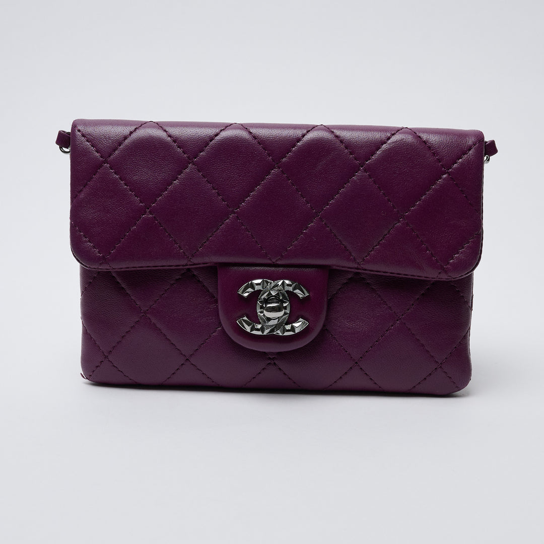 Purple Lambskin Leather Quilted Mini Flap Bag. (front)