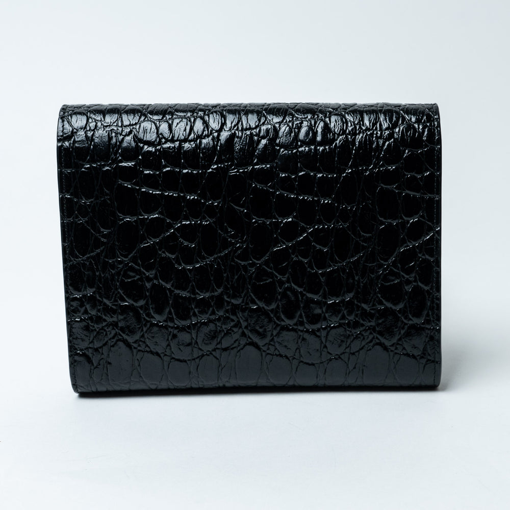 Black Croc-Embossed Leather Cassandre Chain Clutch. (view 2)