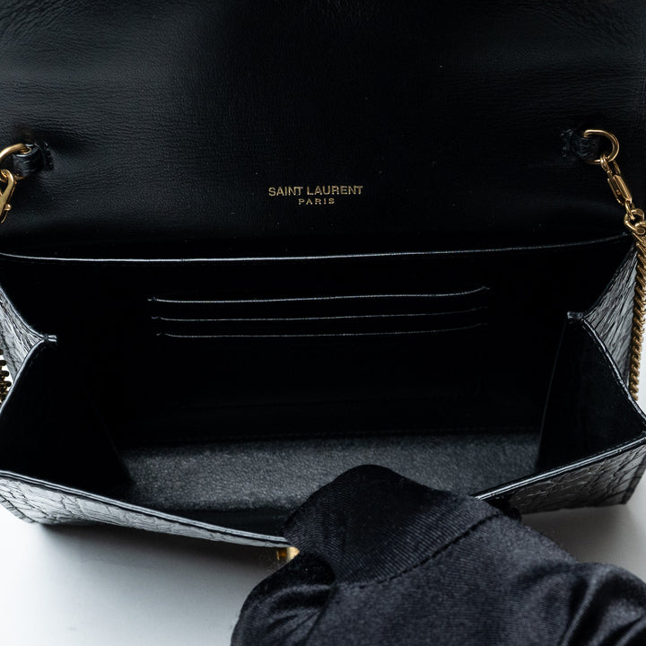 Black Croc-Embossed Leather Cassandre Chain Clutch. (view 6)