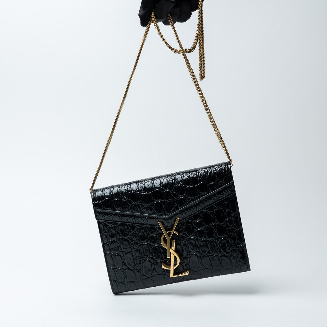 Black Croc-Embossed Leather Cassandre Chain Clutch. (view 8)