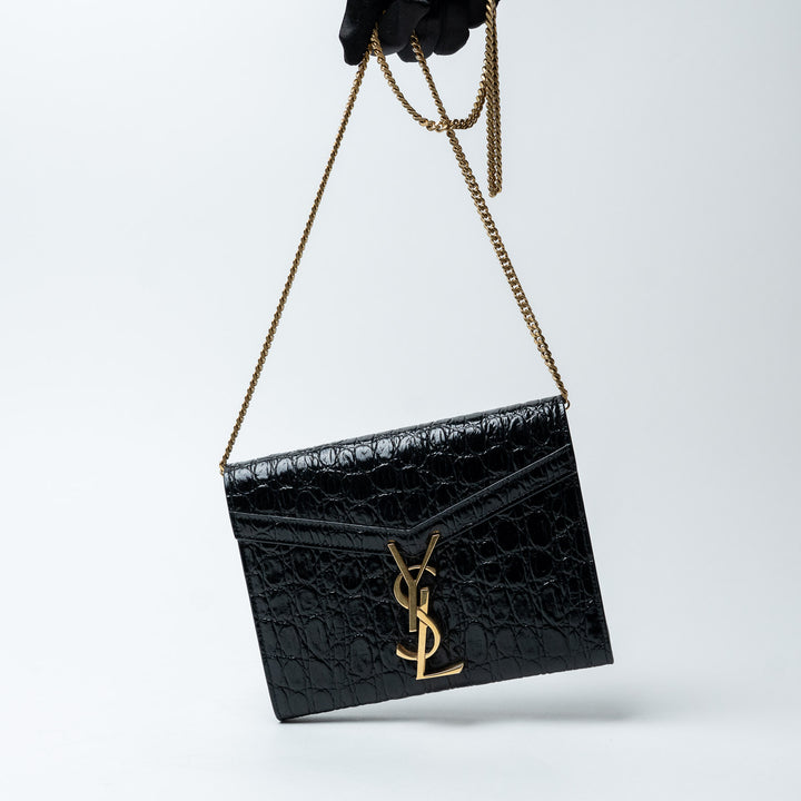 Black Croc-Embossed Leather Cassandre Chain Clutch. (view 8)