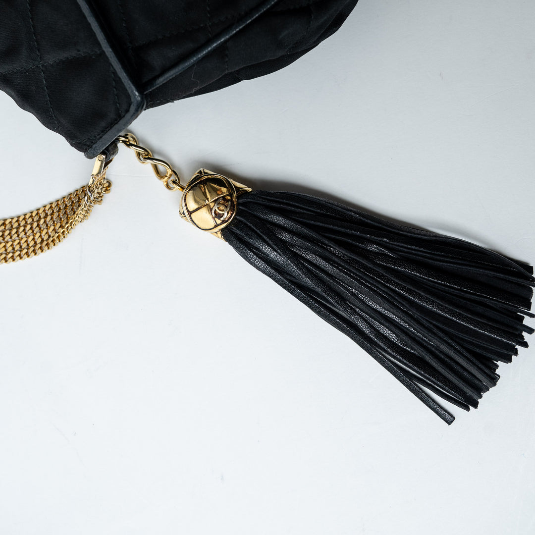 Black Quilted Satin Vintage Tassel Flap Bag. (view 5)