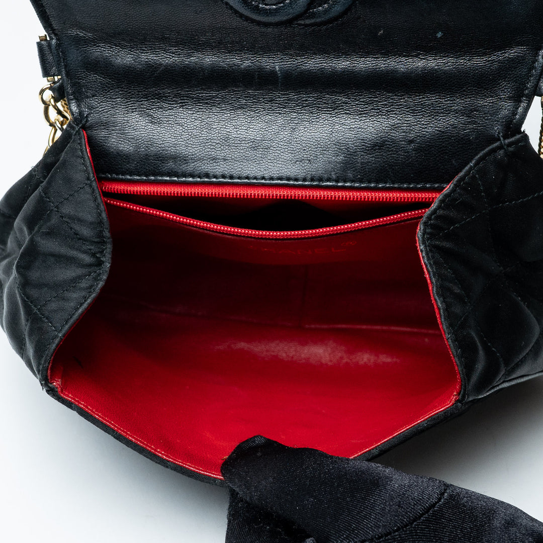 Black Quilted Satin Vintage Tassel Flap Bag. (view 9)