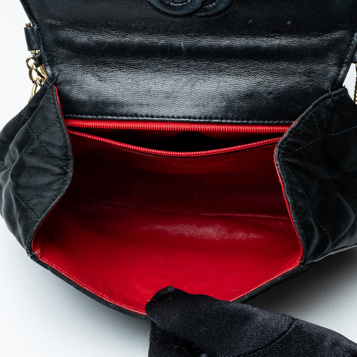 Black Quilted Satin Vintage Tassel Flap Bag. (view 9)