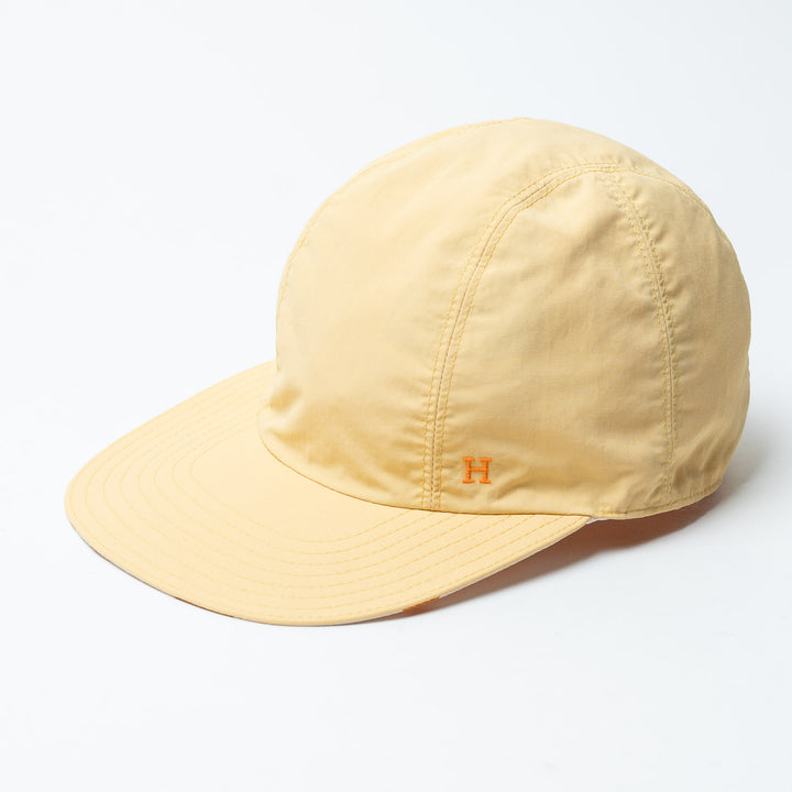 Yellow and Orange Nylon Reversible H Baseball Cap. (front)