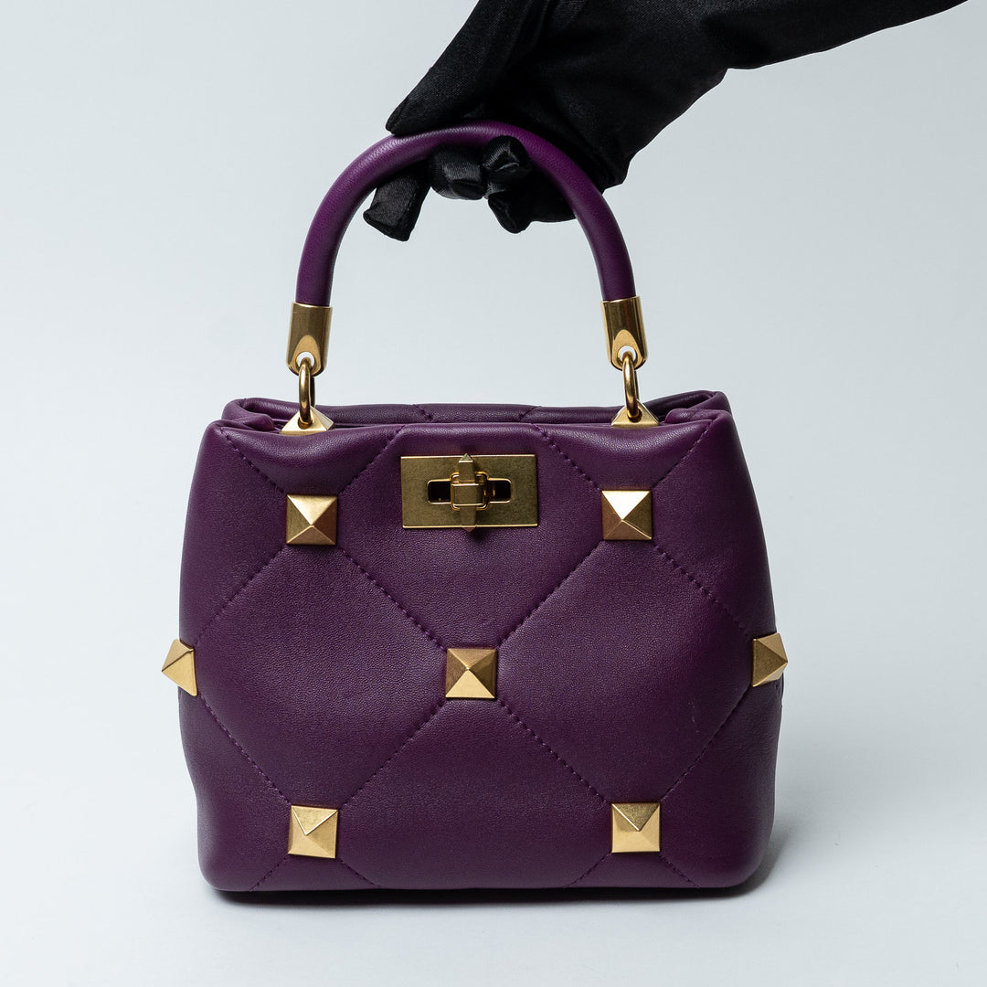 Purple Quilted Nappa Leather Roman Stud Top Handle Bag. (view 5)