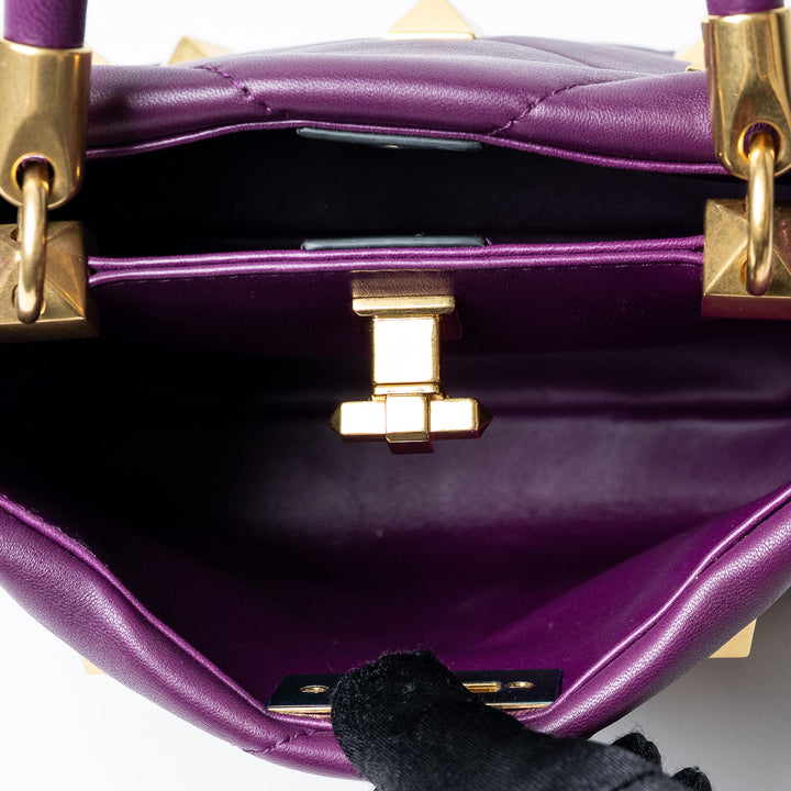 Purple Quilted Nappa Leather Roman Stud Top Handle Bag. (view 6)