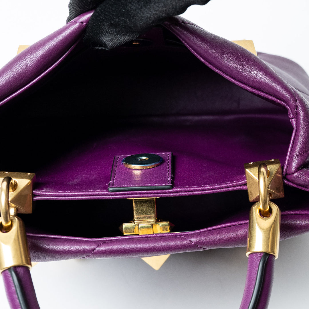Purple Quilted Nappa Leather Roman Stud Top Handle Bag. (view 7)