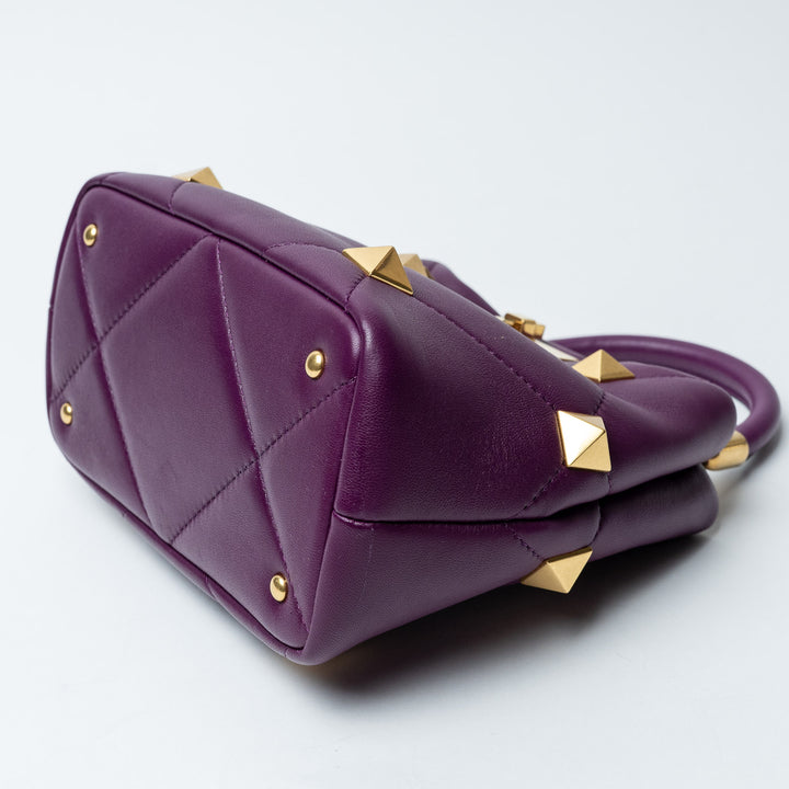 Purple Quilted Nappa Leather Roman Stud Top Handle Bag. (view 10)