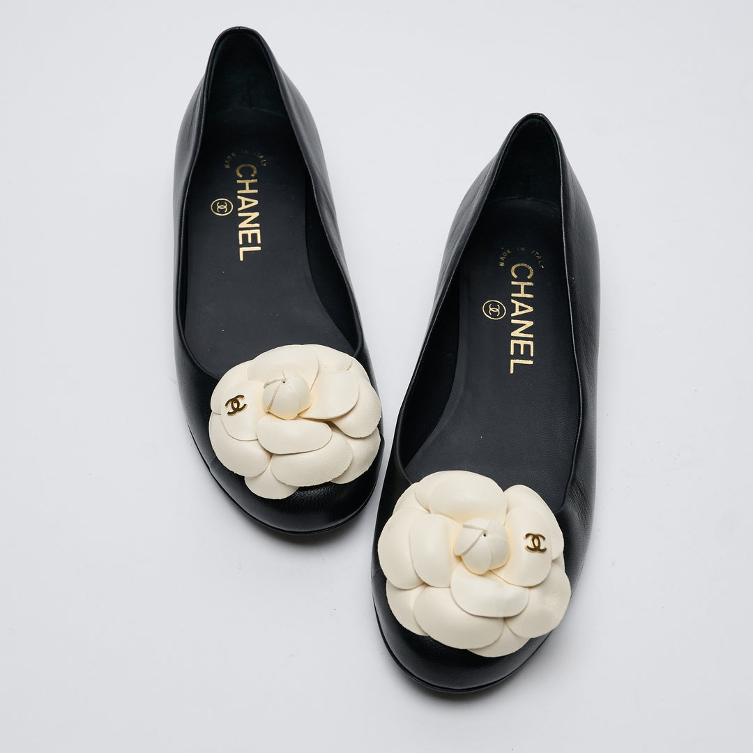 Black Lambskin Leather Camellia Ballet Flats. (front)