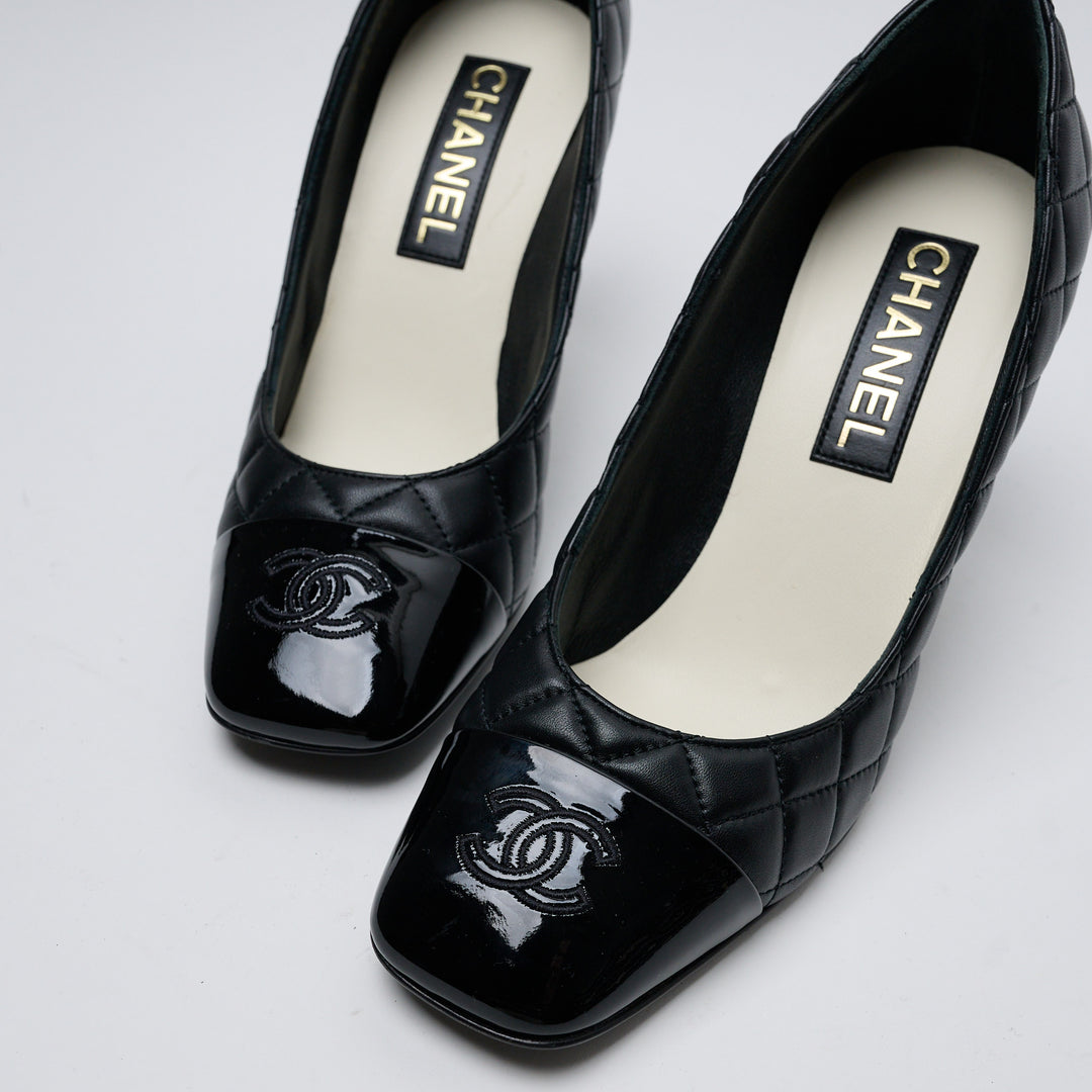 Black Quilted Lambskin Leather Cap Toe Pumps. (view 2)