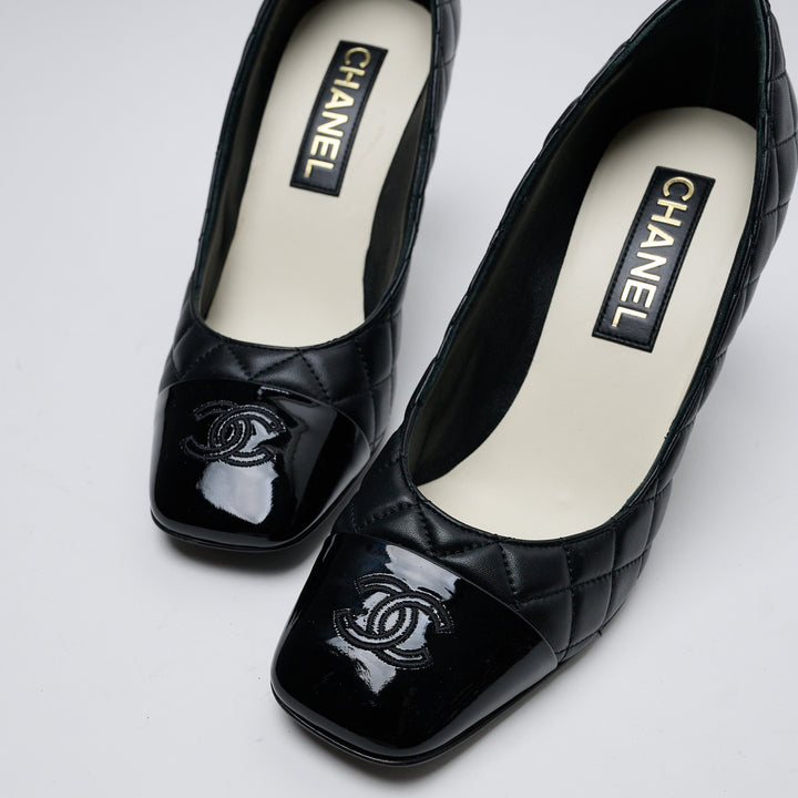 Black Quilted Lambskin Leather Cap Toe Pumps. (view 2)