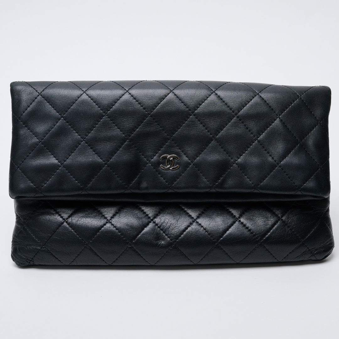 Black Lambskin Leather Quilted Fold-Over Clutch. (front)