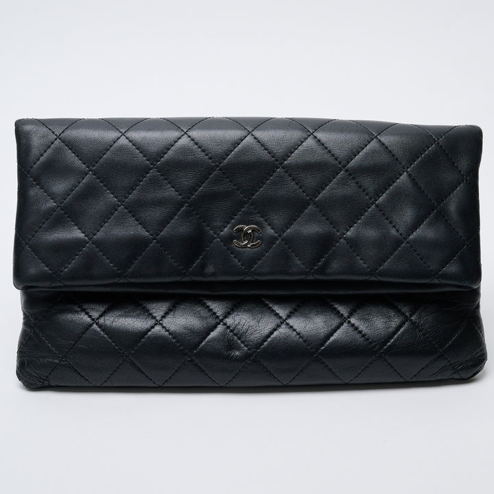 Black Lambskin Leather Quilted Fold-Over Clutch. (front)