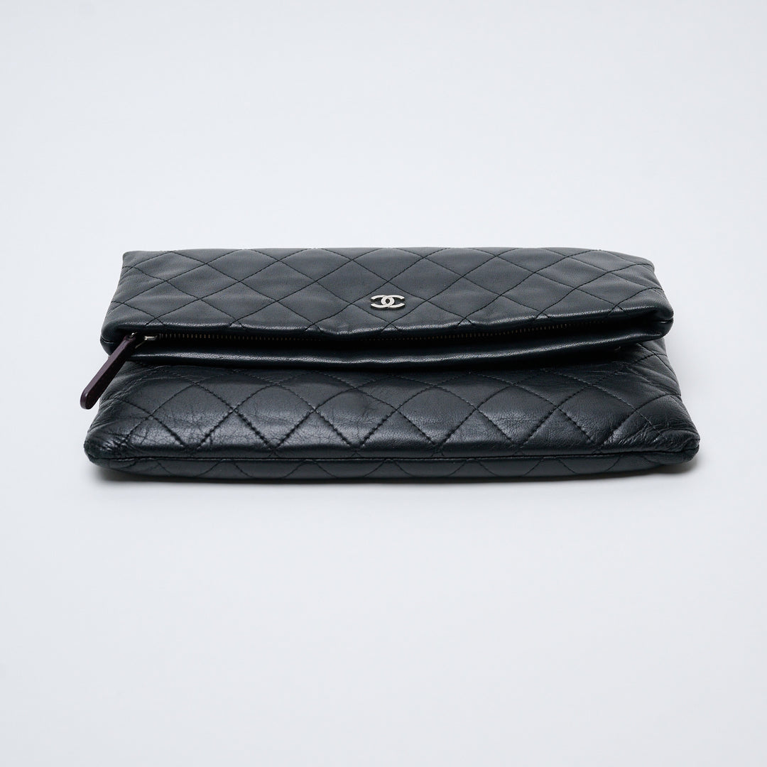 Black Lambskin Leather Quilted Fold-Over Clutch. (view 3)