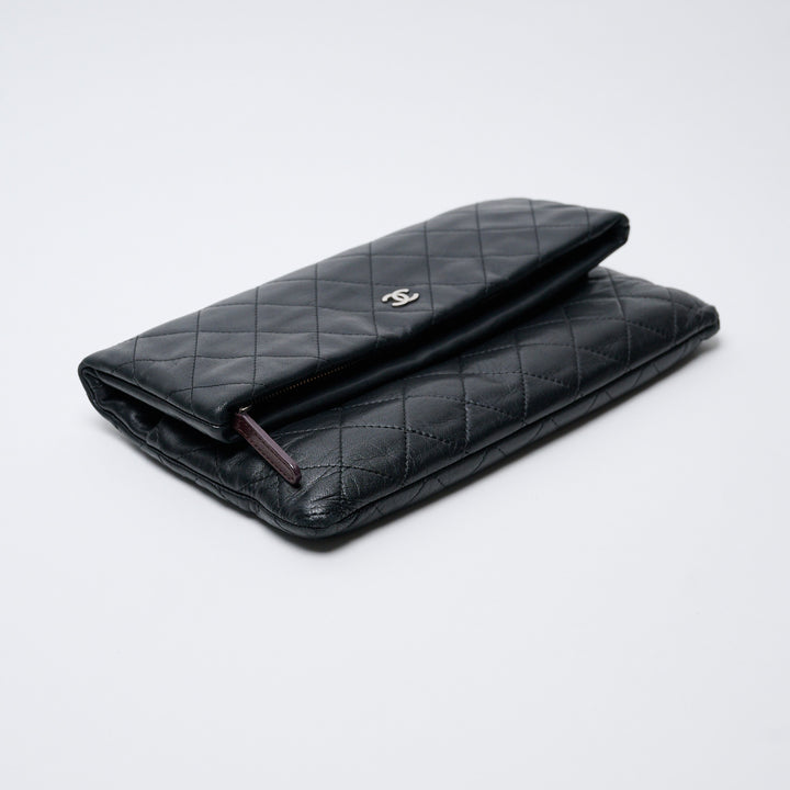 Black Lambskin Leather Quilted Fold-Over Clutch. (view 4)