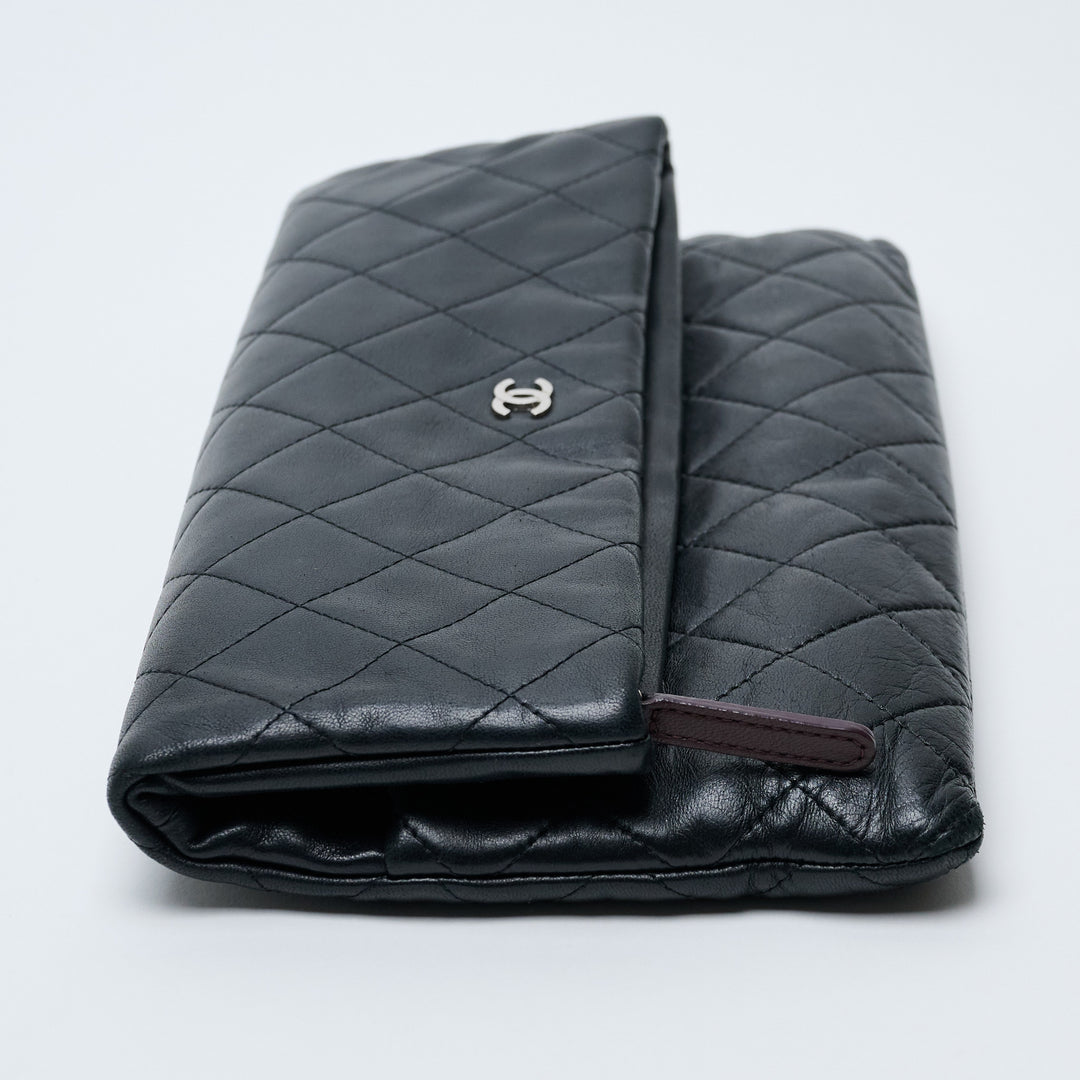 Black Lambskin Leather Quilted Fold-Over Clutch. (view 5)
