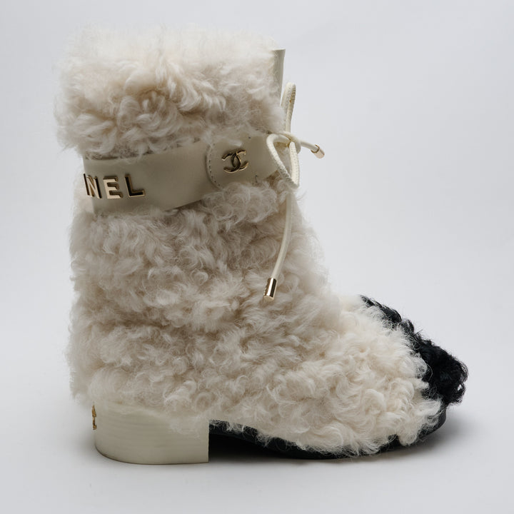 Ivory Shearling Lace-Up Boots. (view 3)