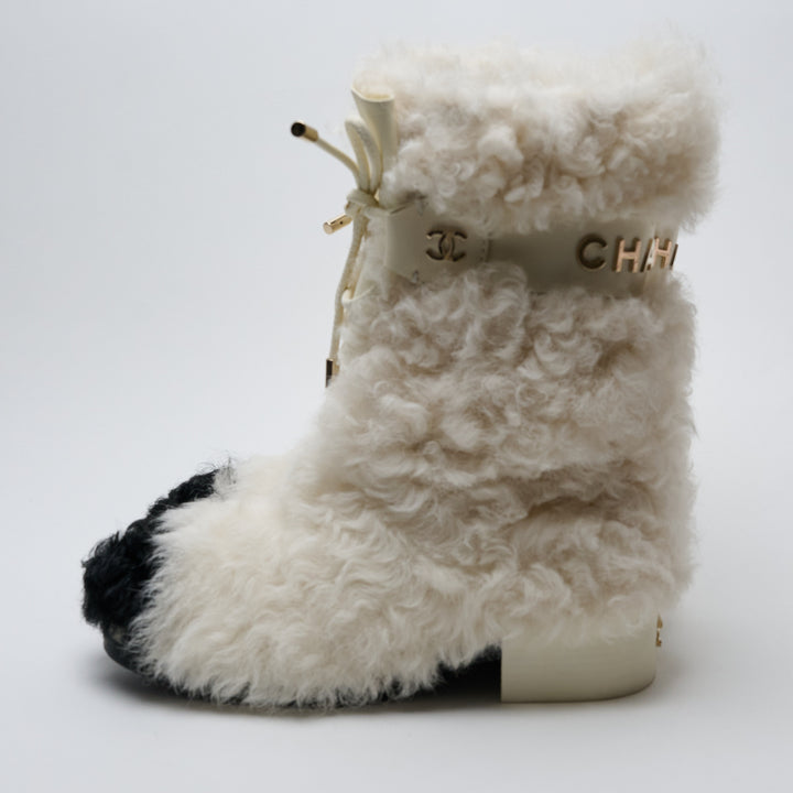 Ivory Shearling Lace-Up Boots. (view 6)