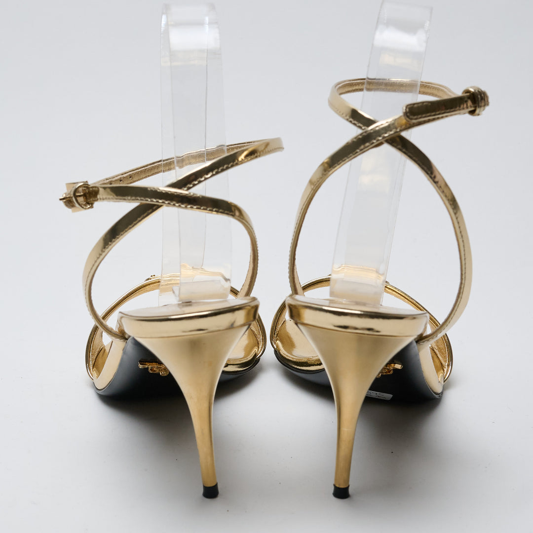 Gold Metallic Leather Ankle Strap Sandals. (view 3)