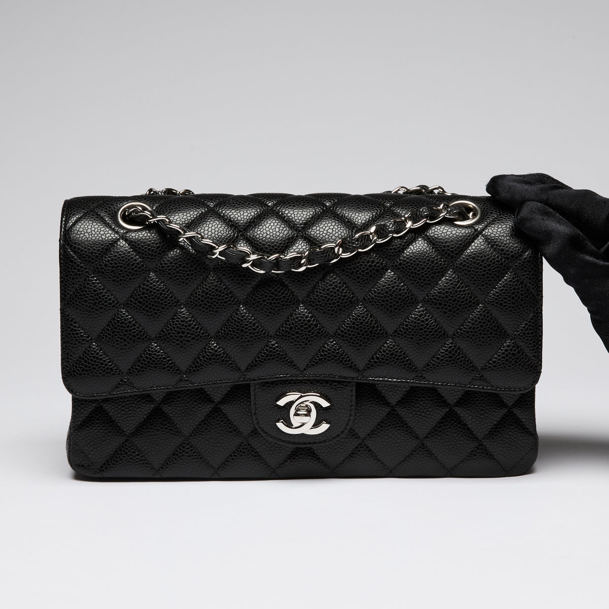 Pre-Loved Chanel ™ Black Pebbled Leather Medium Double Flap Bag