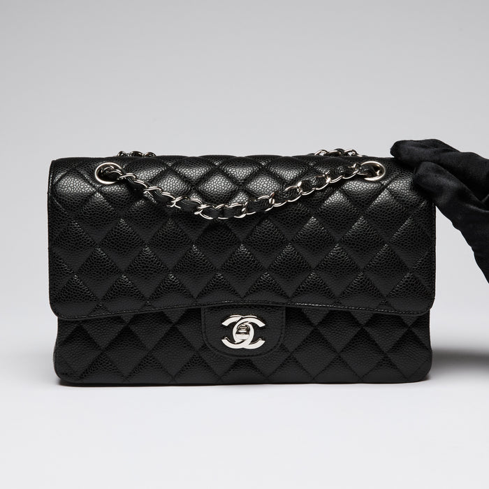 Pre-Loved Chanel ™ Black Pebbled Leather Medium Double Flap Bag with Silver Hardware