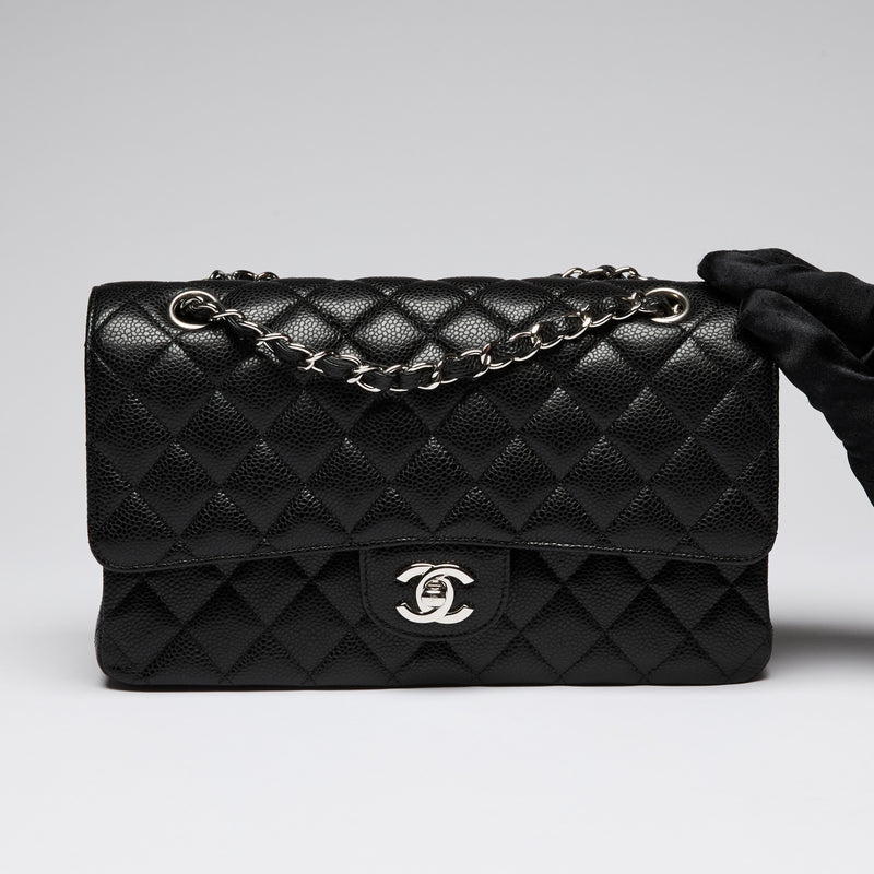 Pre-Loved Chanel ™ Black Pebbled Leather Medium Double Flap Bag