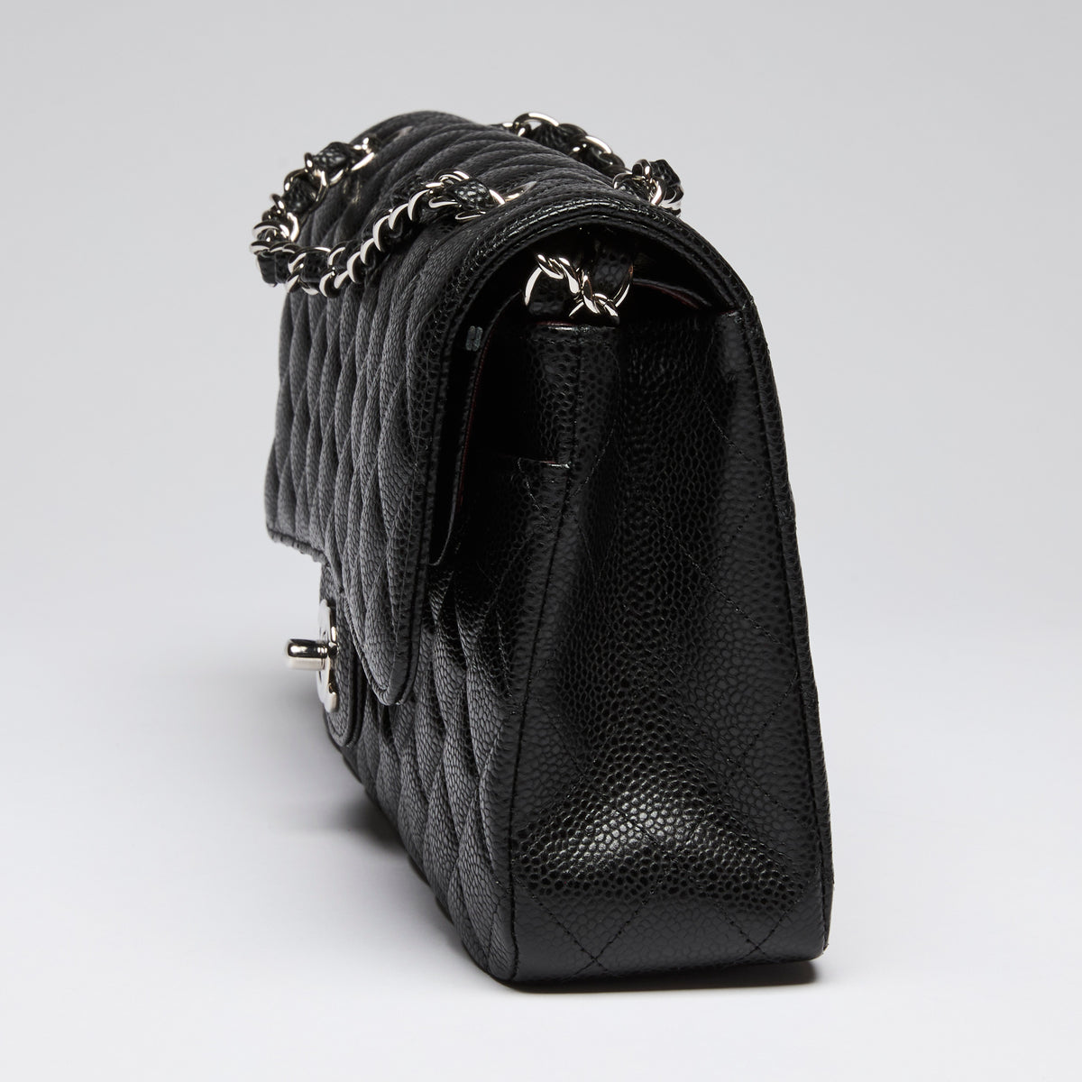 Pre-Loved Chanel ™ Black Pebbled Leather Medium Double Flap Bag
