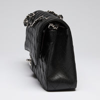 Pre-Loved Chanel ™ Black Pebbled Leather Medium Double Flap Bag