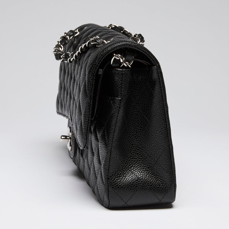 Pre-Loved Chanel ™ Black Pebbled Leather Medium Double Flap Bag