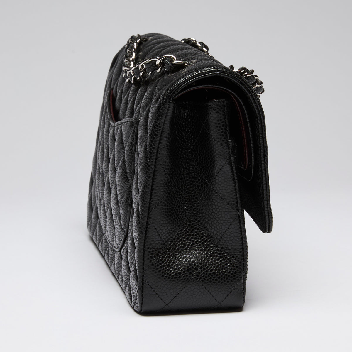 Pre-Loved Chanel ™ Black Pebbled Leather Medium Double Flap Bag