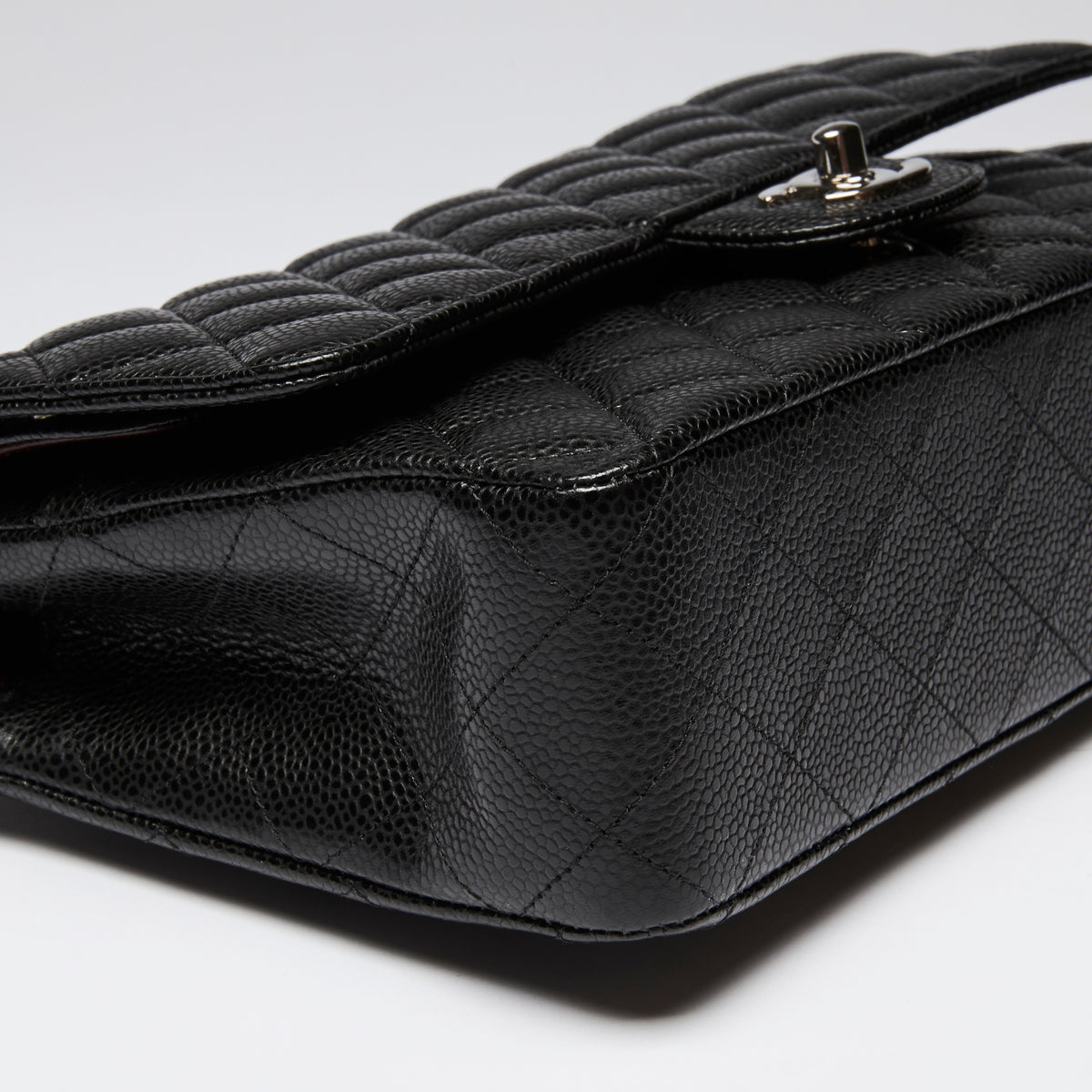 Pre-Loved Chanel ™ Black Pebbled Leather Medium Double Flap Bag