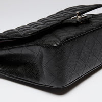 Pre-Loved Chanel ™ Black Pebbled Leather Medium Double Flap Bag