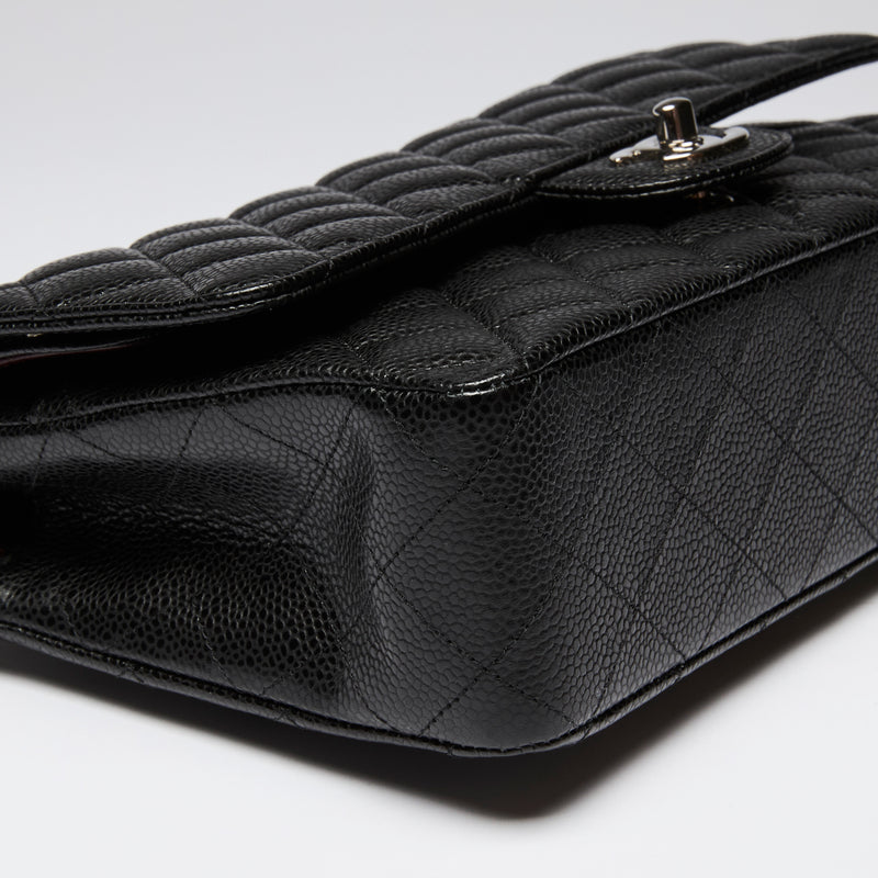 Pre-Loved Chanel ™ Black Pebbled Leather Medium Double Flap Bag