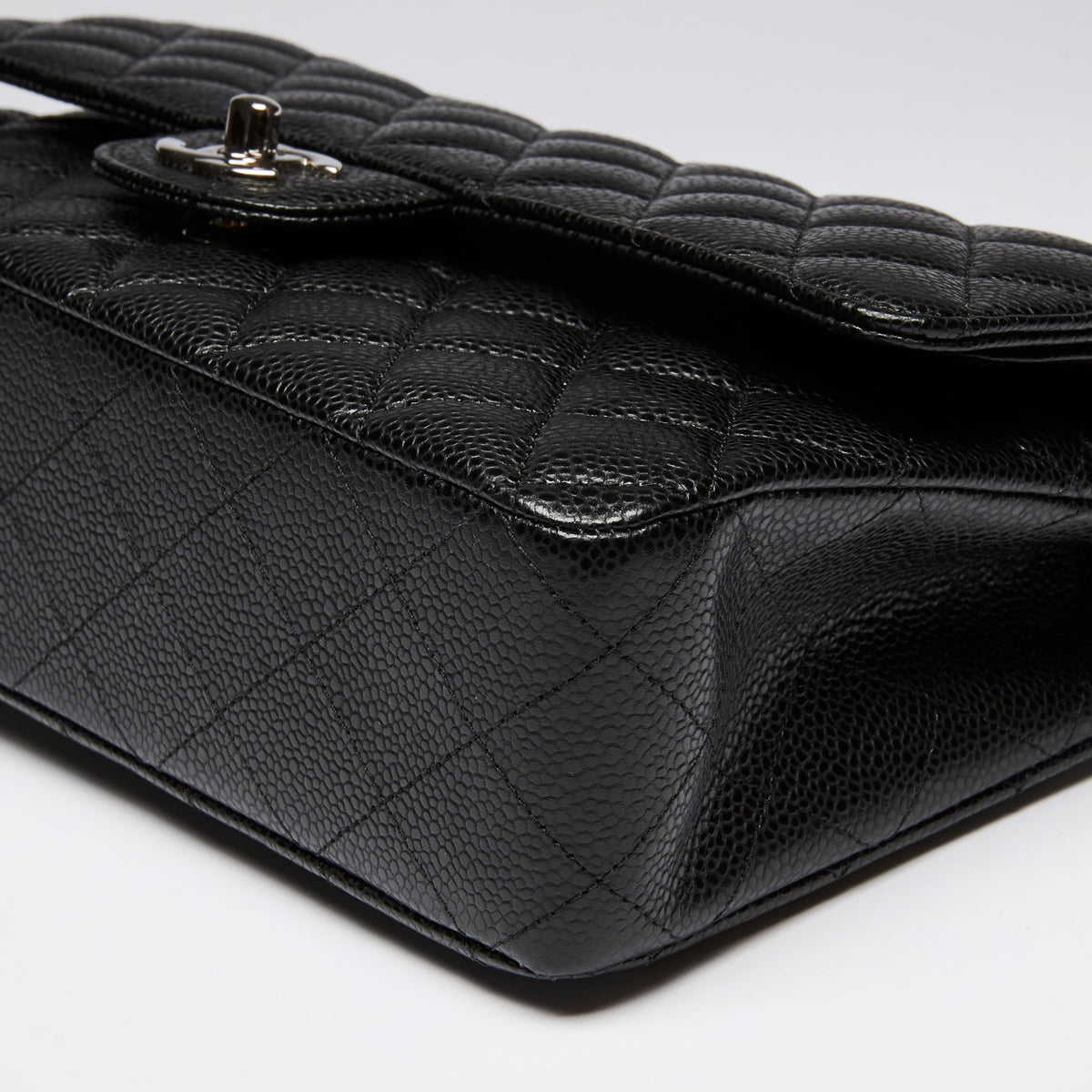 Pre-Loved Chanel ™ Black Pebbled Leather Medium Double Flap Bag