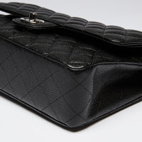 Pre-Loved Chanel ™ Black Pebbled Leather Medium Double Flap Bag