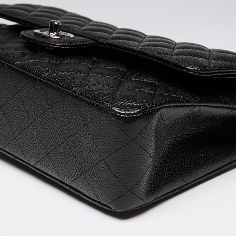 Pre-Loved Chanel ™ Black Pebbled Leather Medium Double Flap Bag