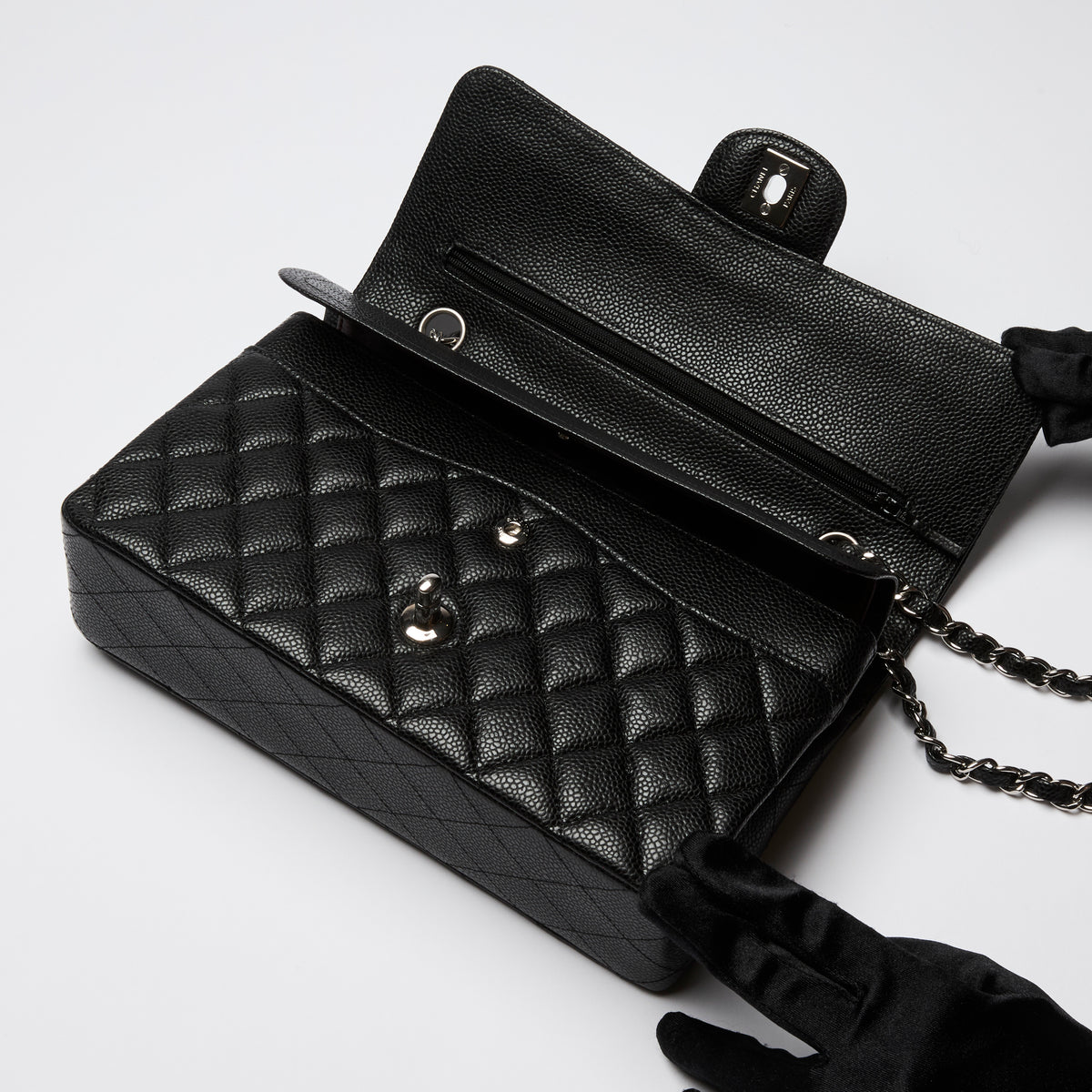 Pre-Loved Chanel ™ Black Pebbled Leather Medium Double Flap Bag