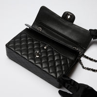 Pre-Loved Chanel ™ Black Pebbled Leather Medium Double Flap Bag
