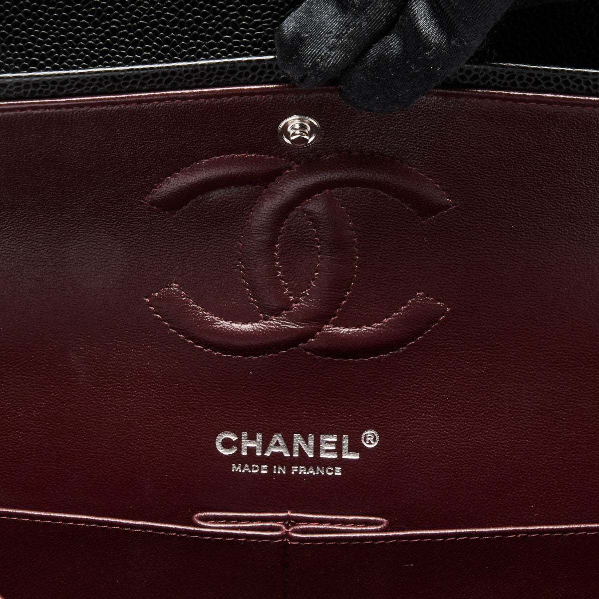 Pre-Loved Chanel ™ Black Pebbled Leather Medium Double Flap Bag