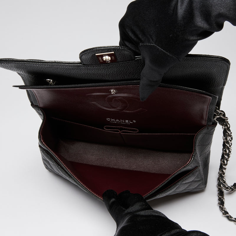 Pre-Loved Chanel ™ Black Pebbled Leather Medium Double Flap Bag