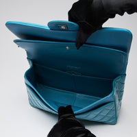 Pre-Loved Chanel ™ Blue Patent Leather Large Double Flap Bag