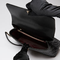 Pre-Loved Chanel™ Black Pebbled Leather Flap Bag with Top Handle