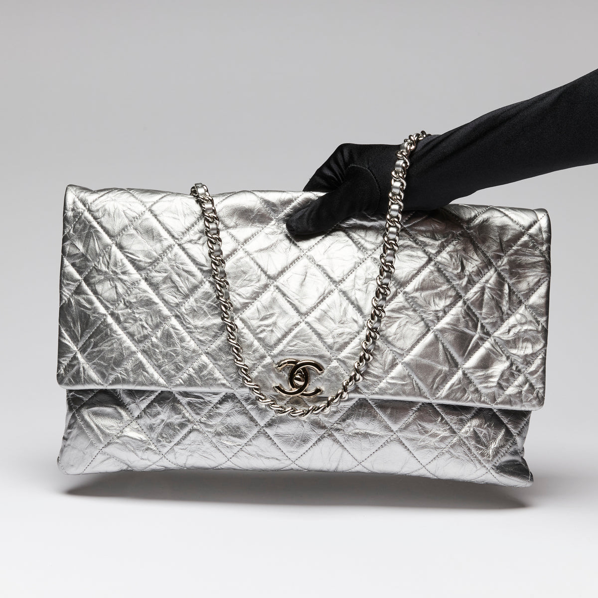 Pre-Loved Chanel™ Brushed Silver Grained Leather 24 Flap Bag